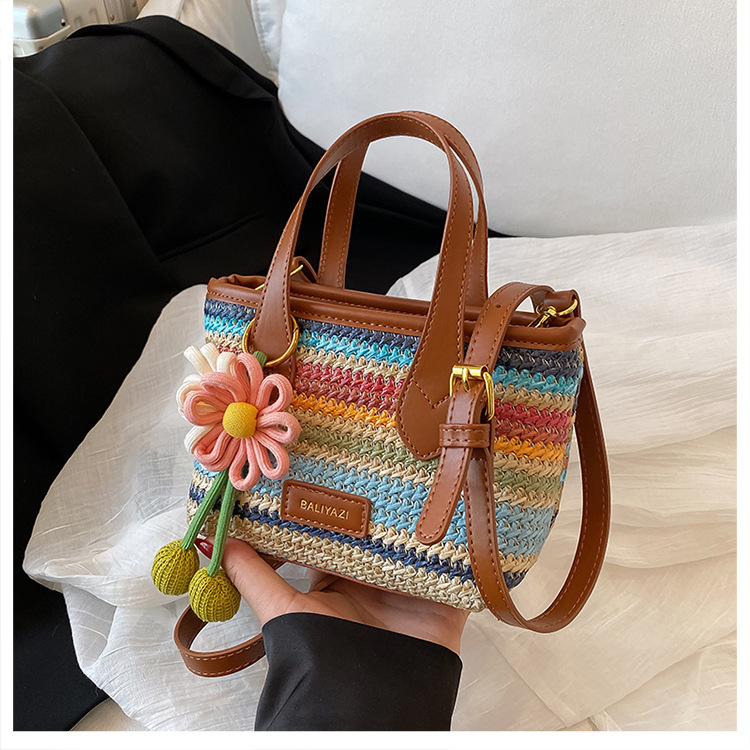 Cross-border rainbow woven floral women's handbag, 2026 new fashionable forest-style vacation crossbody bag, multifunctional straw woven bag 15 O1CN01IUoHs11WEIgx3VfWr 2221436032756 0 cib -bag