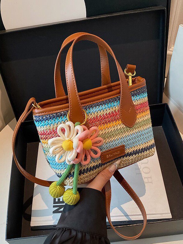 O1CN01TU6P671WEIgwYzO2Q_2221436032756-0-cib.jpg Cross-border rainbow woven floral women's handbag, 2026 new fashionable forest-style vacation crossbody bag, multifunctional straw woven bag