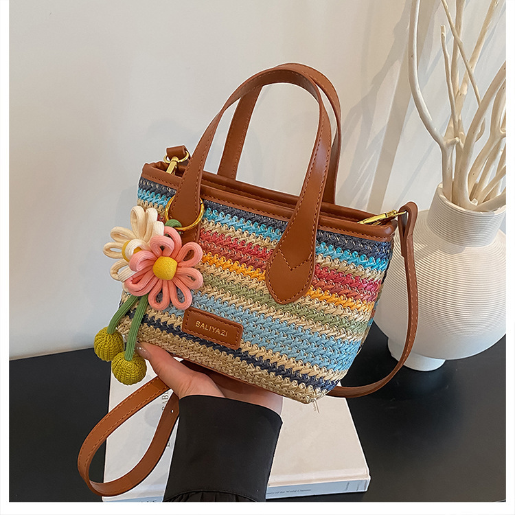 Cross-border rainbow woven floral women's handbag, 2026 new fashionable forest-style vacation crossbody bag, multifunctional straw woven bag 11 O1CN01VVd6NF1WEIgwGzfp4 2221436032756 0 cib -bag