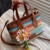 Cross-border rainbow woven floral women's handbag, 2026 new fashionable forest-style vacation crossbody bag, multifunctional straw woven bag