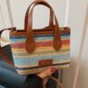 O1CN01huk9ln1WEIgwi5vyU_2221436032756-0-cib.jpg Cross-border rainbow woven floral women's handbag, 2026 new fashionable forest-style vacation crossbody bag, multifunctional straw woven bag